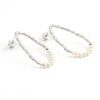 Freshwater pearl open hoop earrings in 18K gold plated and silver plated finish featuring fourteen round pearls and an organic open design