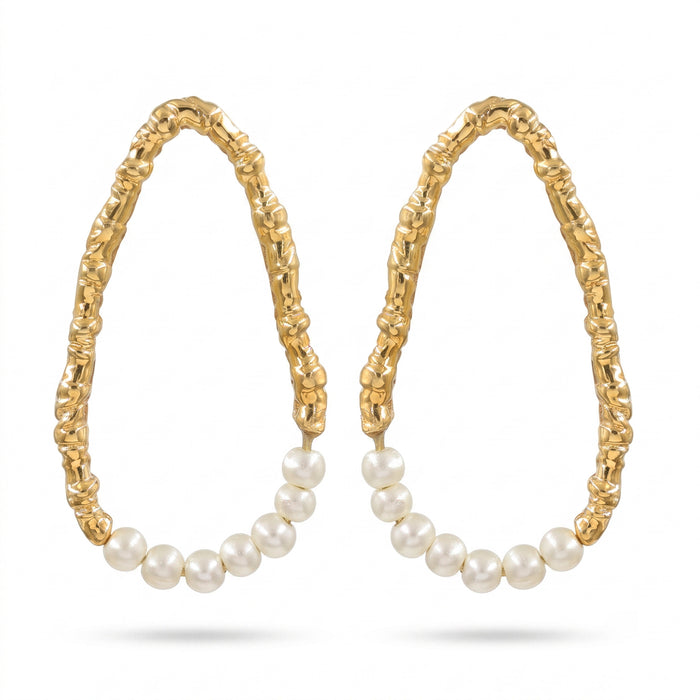 Freshwater pearl open hoop earrings in 18K gold plated and silver plated finish featuring fourteen round pearls and an organic open design