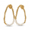 Freshwater pearl open hoop earrings in 18K gold plated and silver plated finish featuring fourteen round pearls and an organic open design
