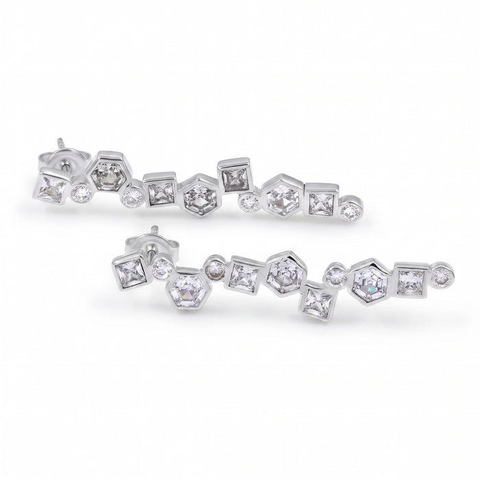 Swarovski crystal geometric statement earrings in silver plated finish with hexagon, square, and round crystal accents.