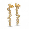 Swarovski crystal geometric statement earrings in 18K gold plated finish with hexagon, square, and round crystal accents.