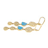 Gold earring with blue stones on a white background