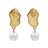Natural freshwater pearl drop earrings with round 7×7 mm pearls.