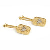 A pair of gold drop earrings featuring textured rectangular pendants with an openwork heart design and a central pave-set heart of clear stones, shown on a white background.