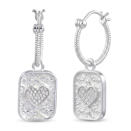 A pair of silver hoop earrings with rectangular dangling charms. Each charm features a textured silver background, a central pavé heart, and a twisted rope detail leading to the hoop.