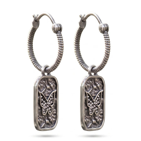 Silver plated butterfly hoop earrings with Swarovski crystal accents and textured rectangular charms for women