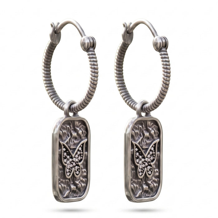 Silver plated butterfly hoop earrings with Swarovski crystal accents and textured rectangular charms for women