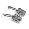 Silver plated butterfly hoop earrings with Swarovski crystal accents and textured rectangular charms for women