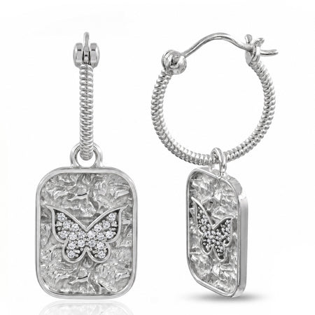 A pair of silver drop earrings featuring textured rectangular pendants with a butterfly motif paved with small clear stones, shown on a white background.