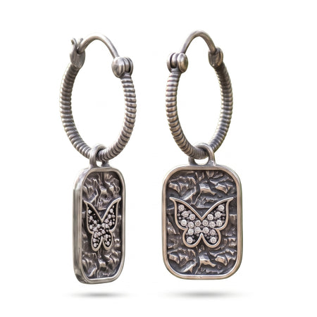 Silver plated butterfly hoop earrings with Swarovski crystal accents and textured rectangular charms for women