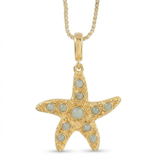 A gold starfish pendant necklace adorned with light blue-green  Amazonite stone, suspended from a gold box chain against a white background.