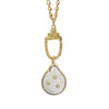 A gold pendant necklace featuring a teardrop-shaped white freshwater pearl charm with three small gold stars, suspended from a textured gold ring on a gold chain, set against a plain white background.