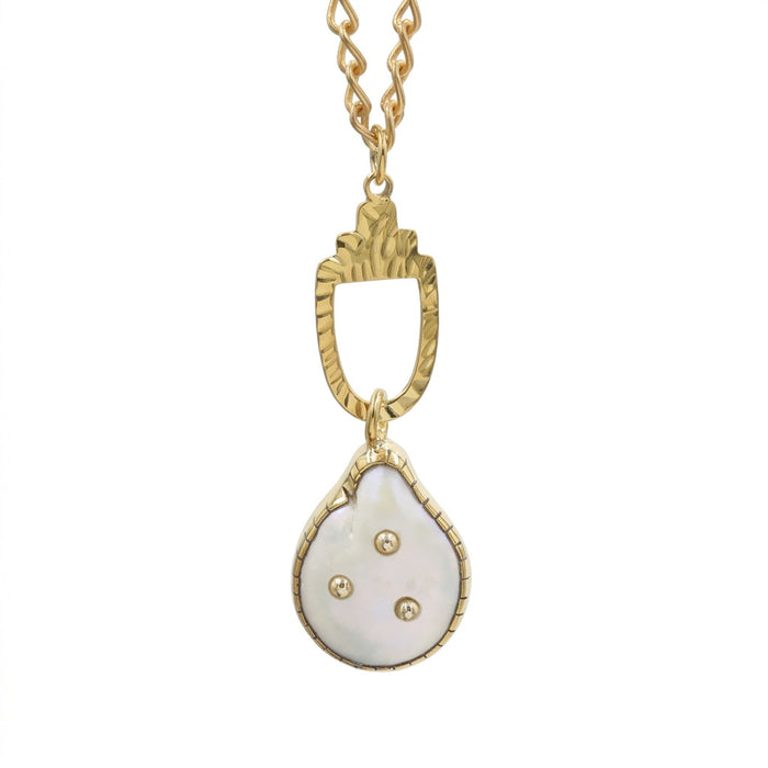 A gold pendant necklace featuring a teardrop-shaped white freshwater pearl charm with three small gold stars, suspended from a textured gold ring on a gold chain, set against a plain white background.