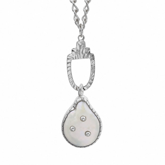 A silver pendant necklace featuring a teardrop-shaped white Freshwater pearl charm with three small silver star accents, suspended from a textured silver bail on a matching chain, set against a plain white background.