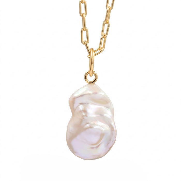 Back view of a gold paperclip chain necklace with a single free-size baroque freshwater pearl pendant featuring metal stud accents