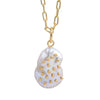 Front view of a gold paperclip chain necklace with a single free-size baroque freshwater pearl pendant featuring metal stud accents
