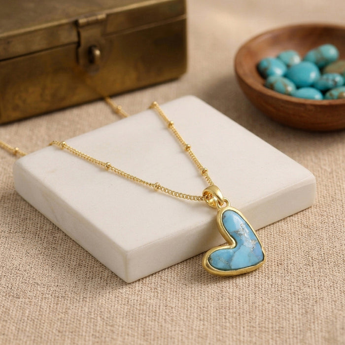 Natural blue turquoise heart pendant necklace in gold and silver plated finish
