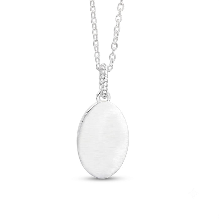 A silver oval pendant necklace with a brushed finish, suspended from a delicate silver chain against a plain white background.