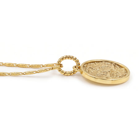 A 18K gold plated pendant necklace featuring a textured, circular medallion pendant on a matching twisted chain, shown against a plain white background.