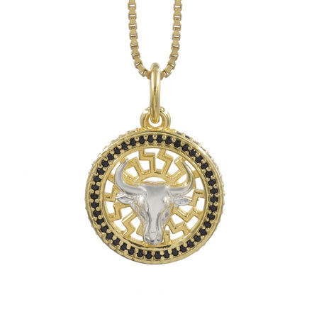 Black onyx Taurus bull pendant necklace in 1 micron 18K gold plated finish, suspended from a gold box chain against a white background.