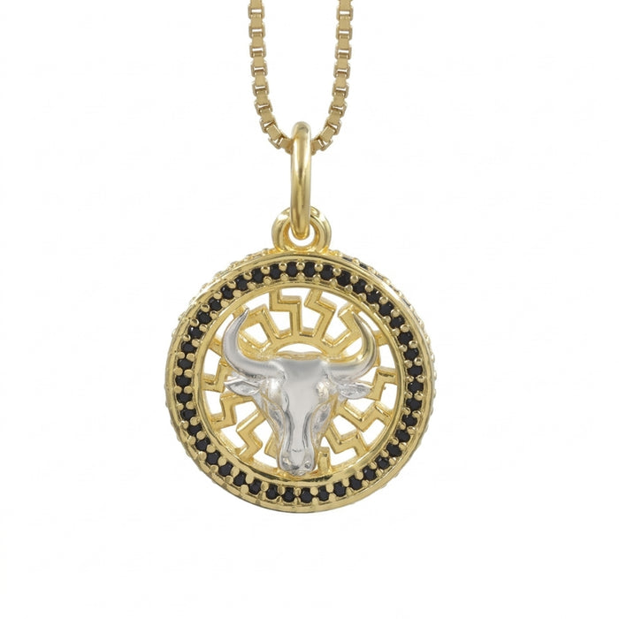 Black onyx Taurus bull pendant necklace in 1 micron 18K gold plated finish, suspended from a gold box chain against a white background.