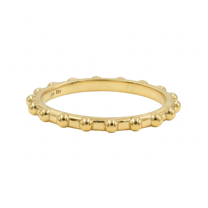 A yellow gold beaded band ring with a polished finish, set against a plain white background.