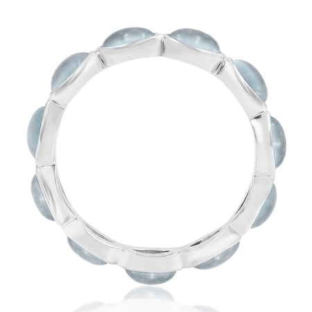 Silver ring with Aquamarine blue gemstones on a white background