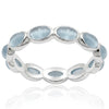 Silver ring with Aquamarine light blue stones on a white background