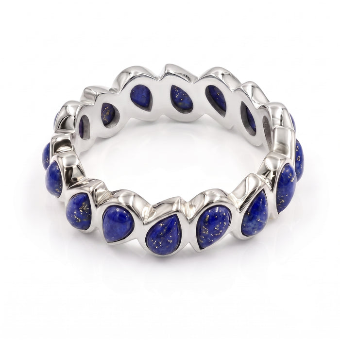 Close-up view of lapis lazuli pear-cut eternity ring showing prong settings and natural pyrite inclusions