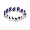 Front view of silver plated eternity statement ring set with 16 pear-cut natural lapis lazuli gemstones