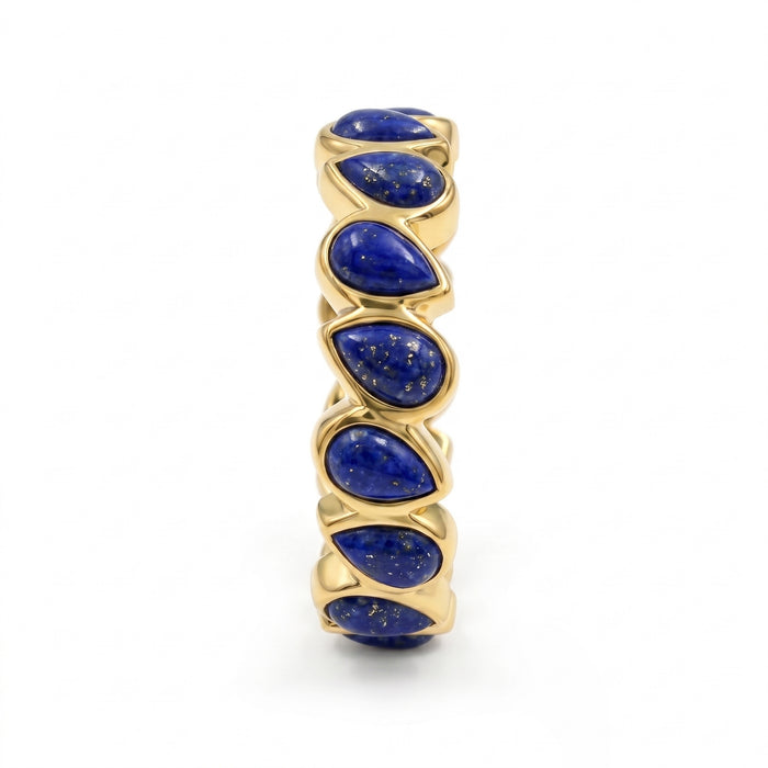 Close-up view of lapis lazuli pear-cut eternity ring showing prong settings and natural pyrite inclusions