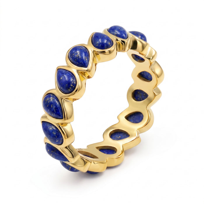Close-up view of lapis lazuli pear-cut eternity ring showing prong settings and natural pyrite inclusions