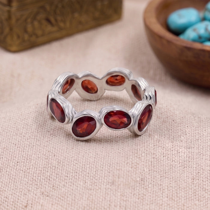 Natural garnet eternity band ring with 10 oval 4x6 mm garnet gemstones in Silver plated finish