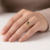 Natural black onyx ring in 18K gold plated finish with one 5×5 mm round black onyx gemstone and four Swarovski crystal accents.