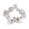 A silver-toned eternity ring featuring multiple bezel-set clear stones in square, round and hexagonal shapes, arranged in a continuous band on a white background.