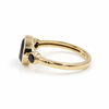 natural black onyx three stone ring in 18k gold plated finish with round bezel set gemstones