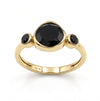 natural black onyx three stone ring in 18k gold plated finish with round bezel set gemstones