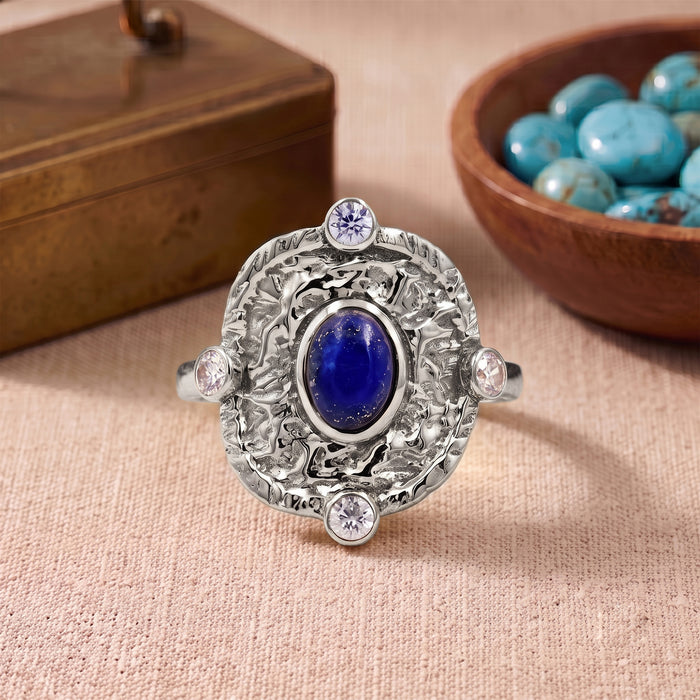 Natural lapis lazuli statement ring with Swarovski crystal accents in silver plated finish.