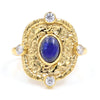 Natural lapis lazuli statement ring with Swarovski crystal accents in 18K gold plated finish.