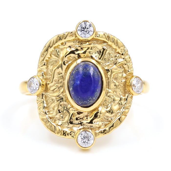 Natural lapis lazuli statement ring with Swarovski crystal accents in 18K gold plated finish.