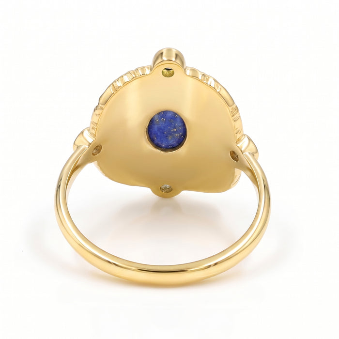 Natural lapis lazuli statement ring with Swarovski crystal accents in 18K gold plated finish.