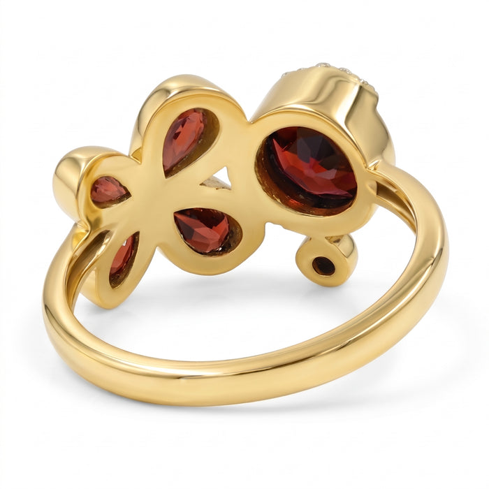 Natural garnet floral bypass ring with pear-cut garnet gemstones and Swarovski crystal accents in 18K gold & silver plated finish on a white background.