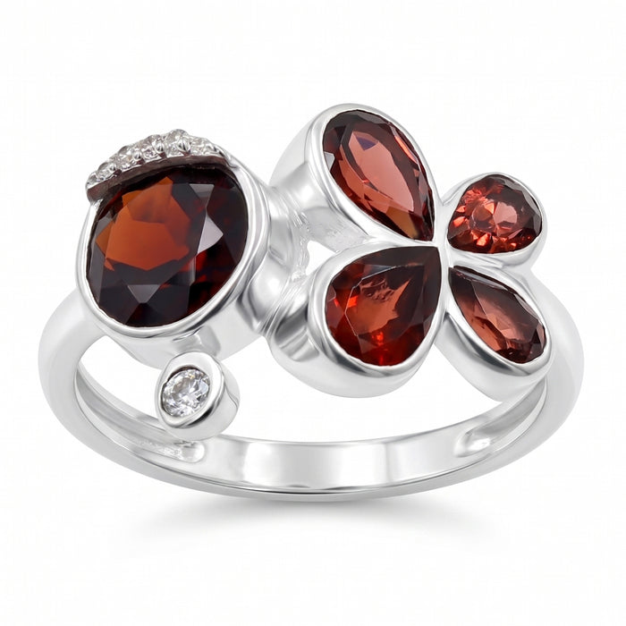 Natural garnet floral bypass ring with pear-cut garnet gemstones and Swarovski crystal accents in 18K gold & silver plated finish on a white background.
