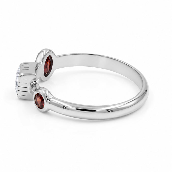 Natural garnet and Swarovski crystal ring in 18K gold plated and silver plated finishes featuring oval, round, and square bezel-set gemstones
