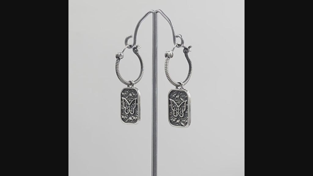Silver plated butterfly hoop earrings with Swarovski crystal accents and textured rectangular charms for women