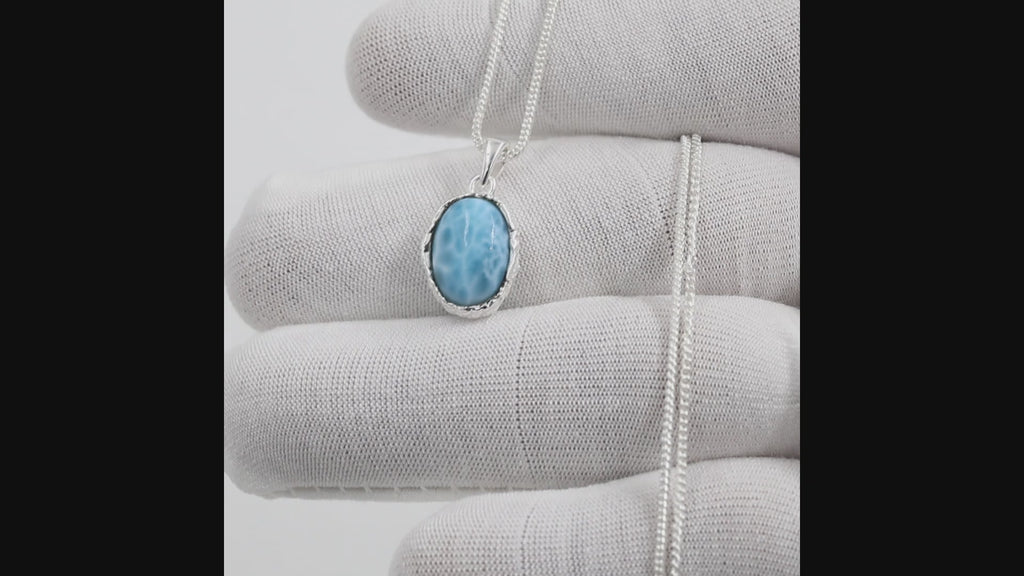 Natural Larimar Oval Gemstone Pendant in Silver plating on a white background